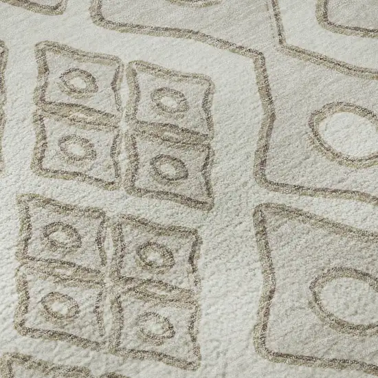 8' Ivory And Beige Geometric Washable Round Rug With UV Protection Photo 9