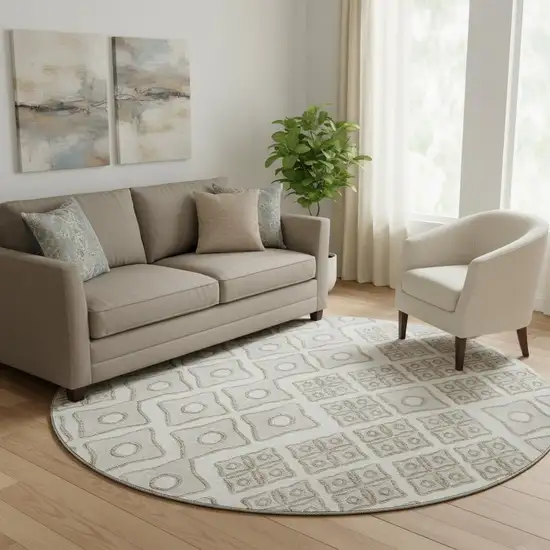 8' Ivory And Beige Geometric Washable Round Rug With UV Protection Photo 1