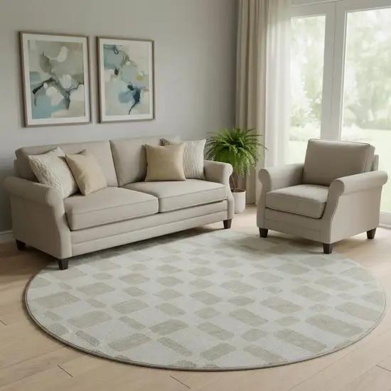 8' Ivory And Beige Geometric Washable Round Rug With UV Protection Photo 1