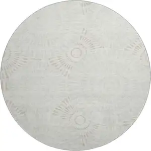 Photo of 8' Ivory And Beige Geometric Washable Round Rug With UV Protection