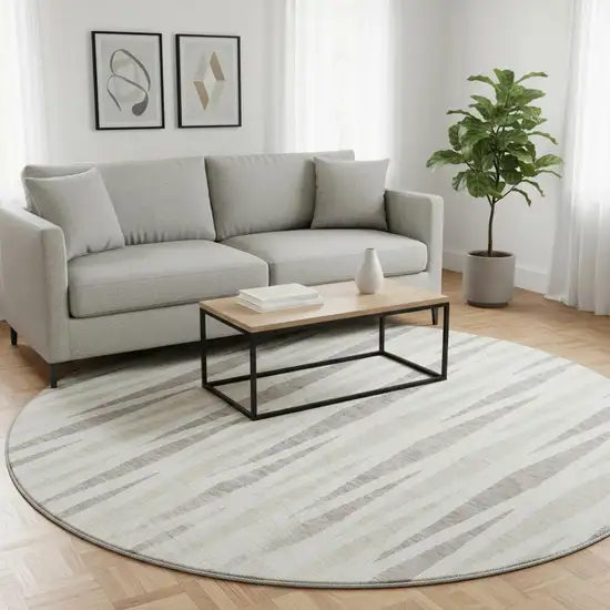 8' Ivory And Beige Geometric Washable Round Rug With UV Protection Photo 2