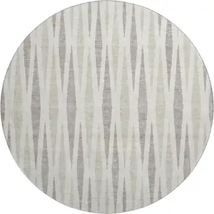 Photo of 8' Ivory And Beige Geometric Washable Round Rug With UV Protection