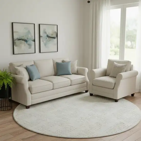 8' Ivory And Beige Geometric Washable Round Rug With UV Protection Photo 1