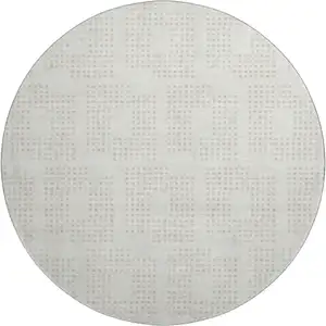 Photo of 8' Ivory And Beige Geometric Washable Round Rug With UV Protection