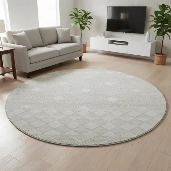 8' Ivory And Beige Geometric Washable Round Rug With UV Protection Photo 2