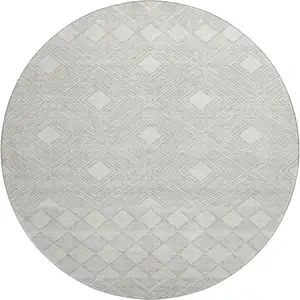 Photo of 8' Ivory And Beige Geometric Washable Round Rug With UV Protection