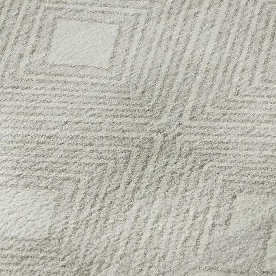 8' Ivory And Beige Geometric Washable Round Rug With UV Protection Photo 9