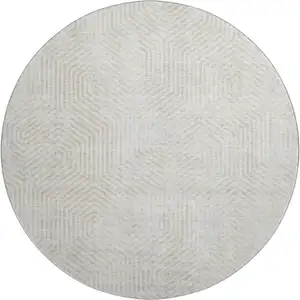 Photo of 8' Ivory And Beige Geometric Washable Round Rug With UV Protection