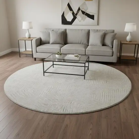 8' Ivory And Beige Geometric Washable Round Rug With UV Protection Photo 2