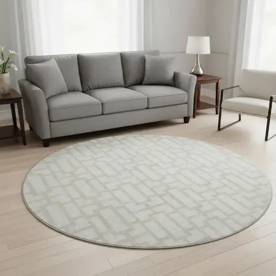 8' Ivory And Beige Geometric Washable Round Rug With UV Protection Photo 2