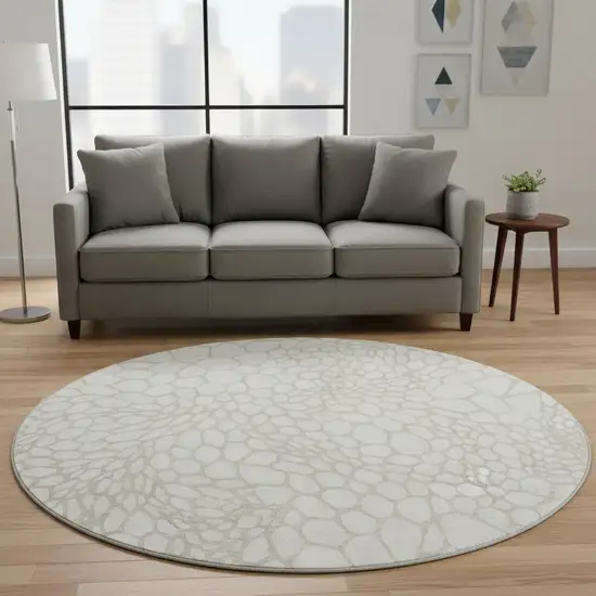 8' Ivory And Beige Geometric Washable Round Rug With UV Protection Photo 2