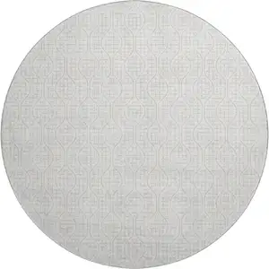 Photo of 8' Ivory And Beige Geometric Washable Round Rug With UV Protection
