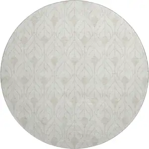 Photo of 8' Ivory And Beige Geometric Washable Round Rug With UV Protection