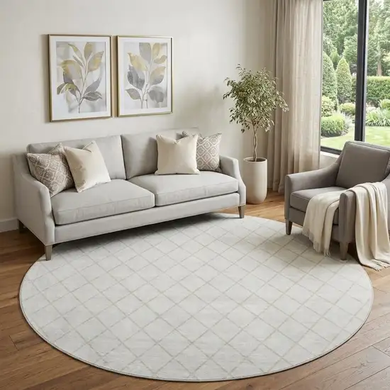 8' Ivory And Beige Geometric Washable Round Rug With UV Protection Photo 1
