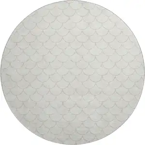Photo of 8' Ivory And Beige Geometric Washable Round Rug With UV Protection