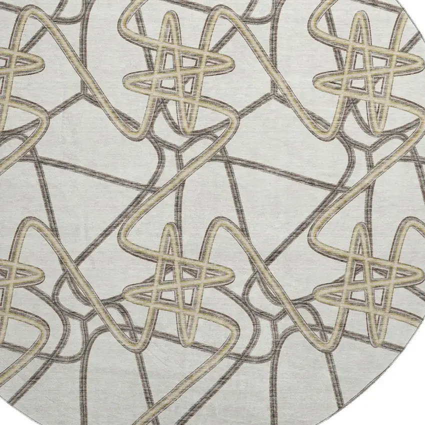 8' Ivory And Beige Geometric Washable Round Rug With UV Protection Photo 2