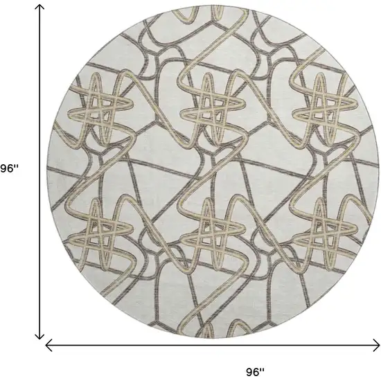 8' Ivory And Beige Geometric Washable Round Rug With UV Protection Photo 9