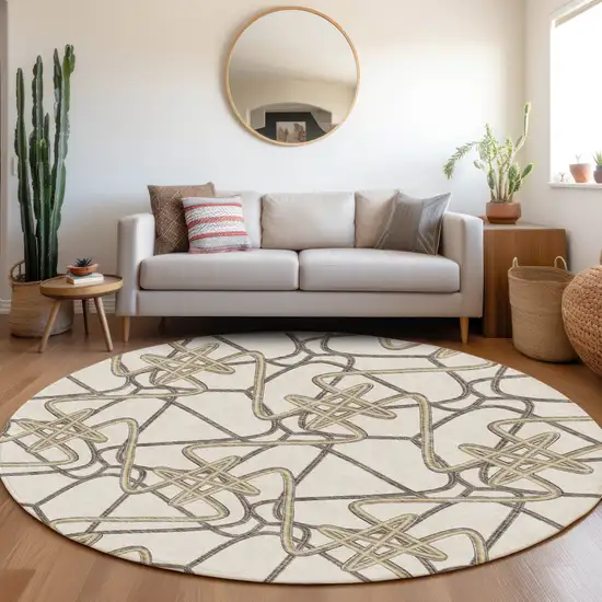 8' Ivory And Beige Geometric Washable Round Rug With UV Protection Photo 4