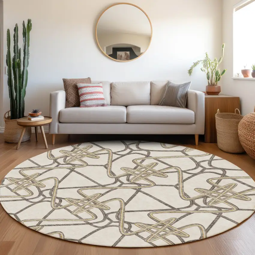 8' Ivory And Beige Geometric Washable Round Rug With UV Protection Photo 4