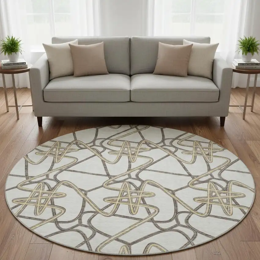 8' Ivory And Beige Geometric Washable Round Rug With UV Protection Photo 2