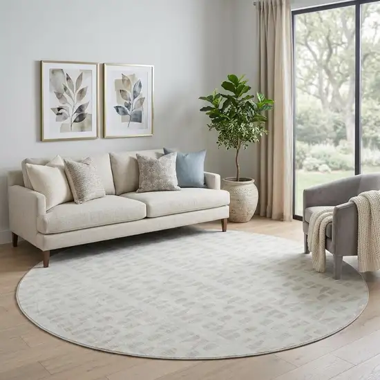 8' Ivory And Beige Geometric Washable Round Rug With UV Protection Photo 1
