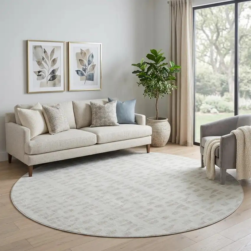 8' Ivory And Beige Geometric Washable Round Rug With UV Protection Photo 1