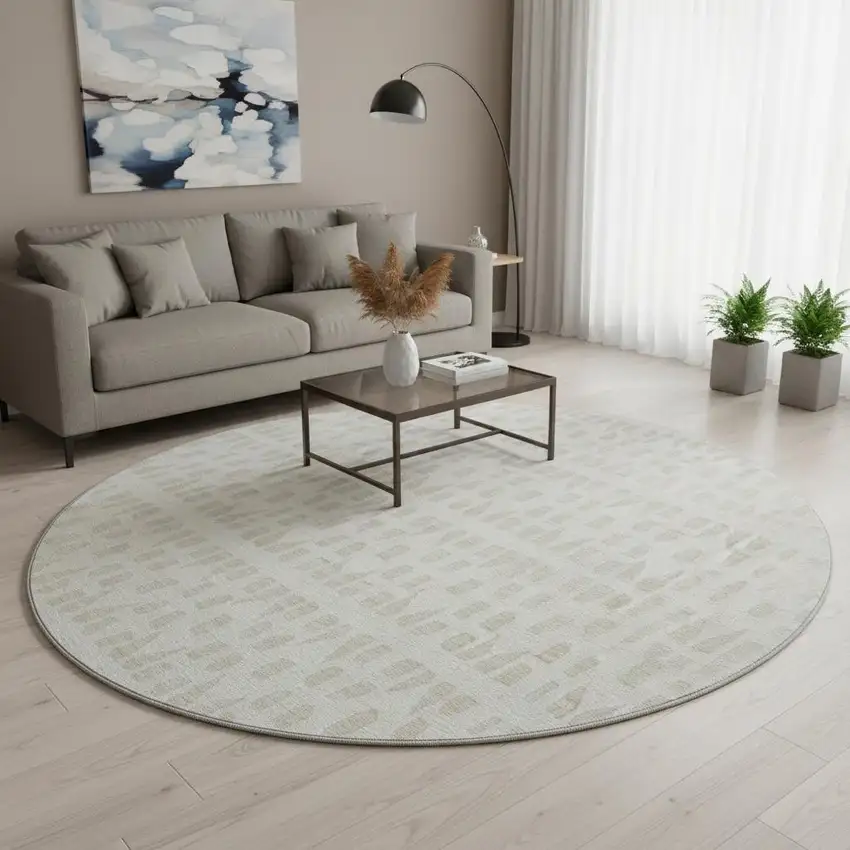 8' Ivory And Beige Geometric Washable Round Rug With UV Protection Photo 2