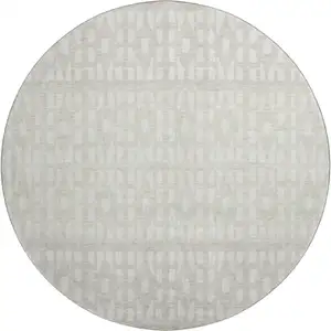 Photo of 8' Ivory And Beige Geometric Washable Round Rug With UV Protection