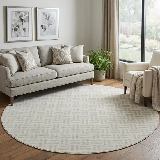 8' Ivory And Beige Geometric Washable Round Rug With UV Protection Photo 1