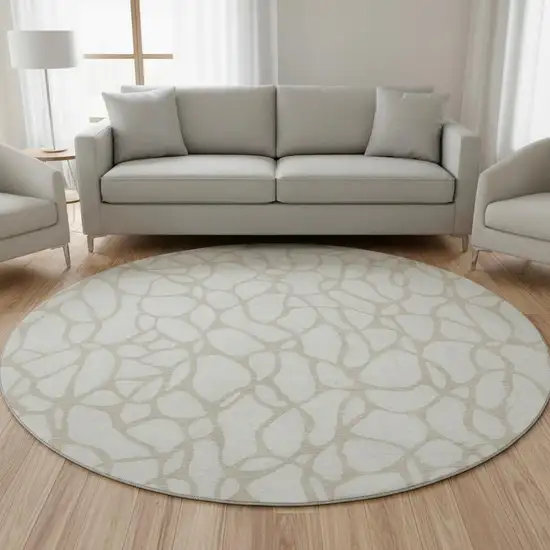 8' Ivory And Beige Geometric Washable Round Rug With UV Protection Photo 2