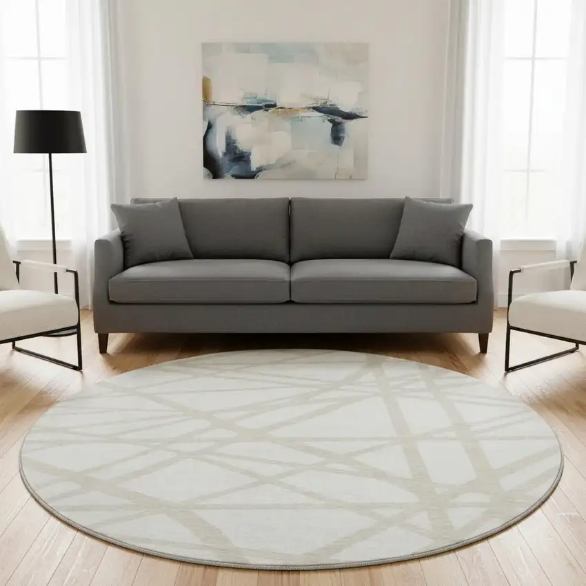 8' Ivory And Beige Geometric Washable Round Rug With UV Protection Photo 2