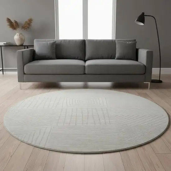 8' Ivory And Beige Geometric Washable Round Rug With UV Protection Photo 2