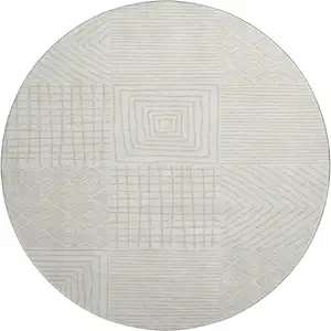 Photo of 8' Ivory And Beige Geometric Washable Round Rug With UV Protection