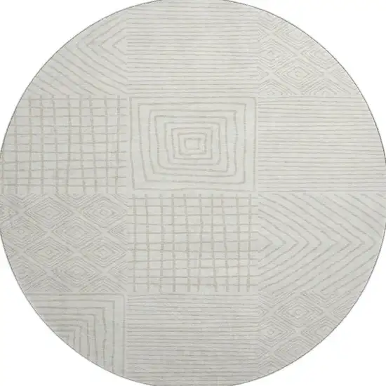 8' Ivory And Beige Geometric Washable Round Rug With UV Protection Photo 2