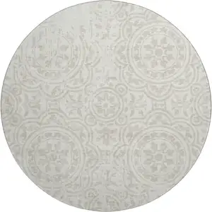 Photo of 8' Ivory And Beige Medallion Washable Round Rug With UV Protection