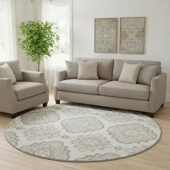 8' Ivory And Beige Medallion Washable Round Rug With UV Protection Photo 1