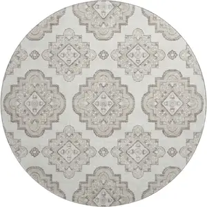 Photo of 8' Ivory And Beige Medallion Washable Round Rug With UV Protection