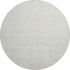 Photo of 8' Ivory And Beige Polka Dot Washable Round Rug With UV Protection