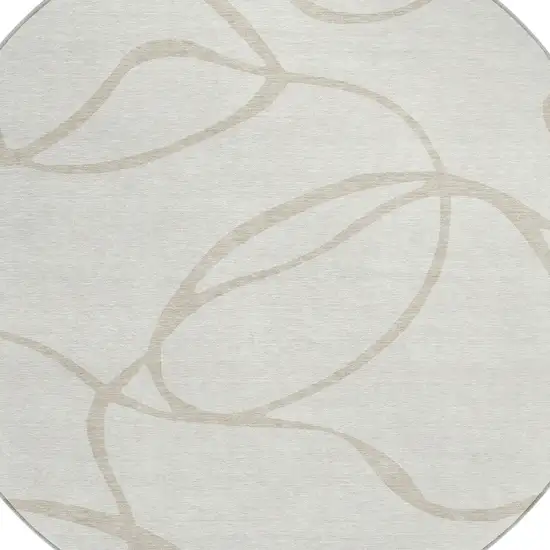 8' Ivory And Beige Round Abstract Washable Indoor Outdoor Area Rug Photo 4