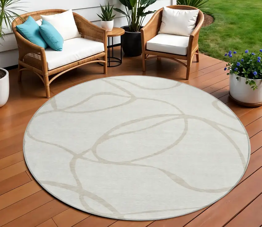 8' Ivory And Beige Round Abstract Washable Indoor Outdoor Area Rug Photo 1