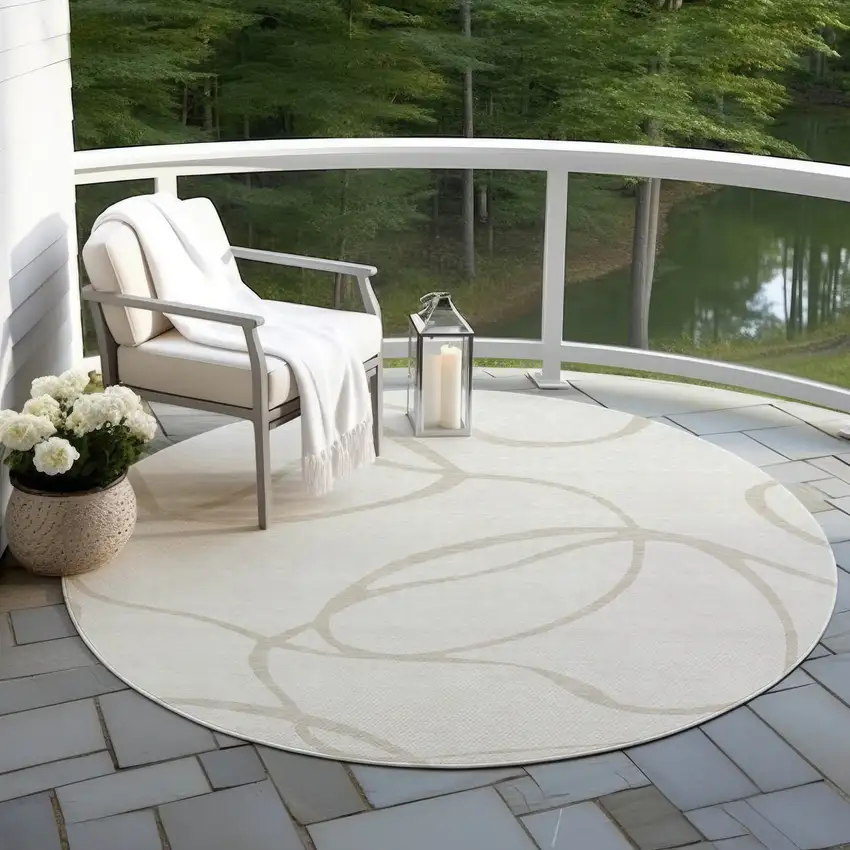 8' Ivory And Beige Round Abstract Washable Indoor Outdoor Area Rug Photo 6