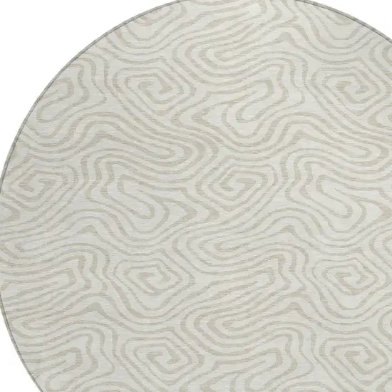 8' Ivory And Beige Round Abstract Washable Indoor Outdoor Area Rug Photo 4