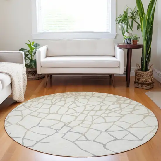 8' Ivory And Beige Round Abstract Washable Indoor Outdoor Area Rug Photo 8