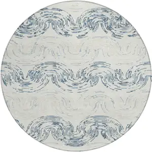 Photo of 8' Ivory And Beige Round Abstract Washable Indoor Outdoor Area Rug