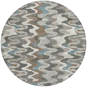 Photo of 8' Ivory And Beige Round Abstract Washable Indoor Outdoor Area Rug