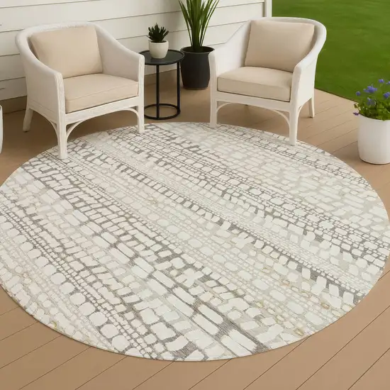 8' Ivory And Beige Round Abstract Washable Indoor Outdoor Area Rug Photo 4
