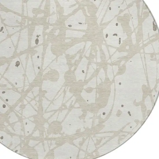 8' Ivory And Beige Round Abstract Washable Indoor Outdoor Area Rug Photo 2