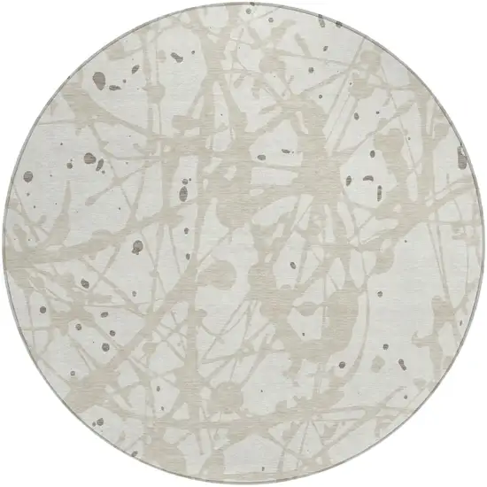 8' Ivory And Beige Round Abstract Washable Indoor Outdoor Area Rug Photo 1