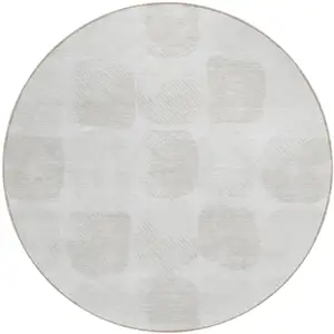Photo of 8' Ivory And Beige Round Abstract Washable Indoor Outdoor Area Rug