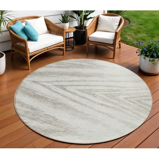 8' Ivory And Beige Round Abstract Washable Indoor Outdoor Area Rug Photo 1